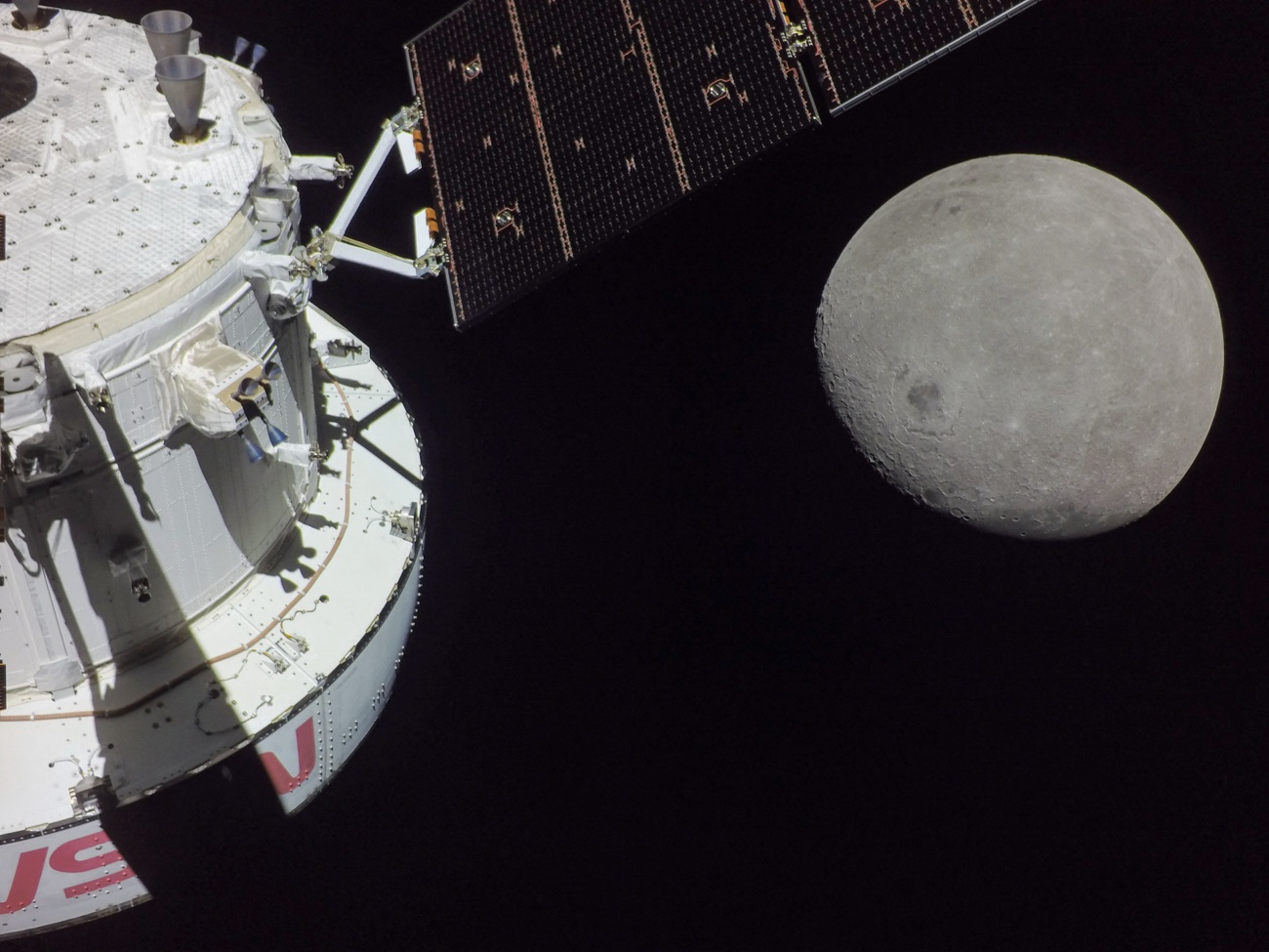 Orion spacecraft approach to lunar orbital insertion.