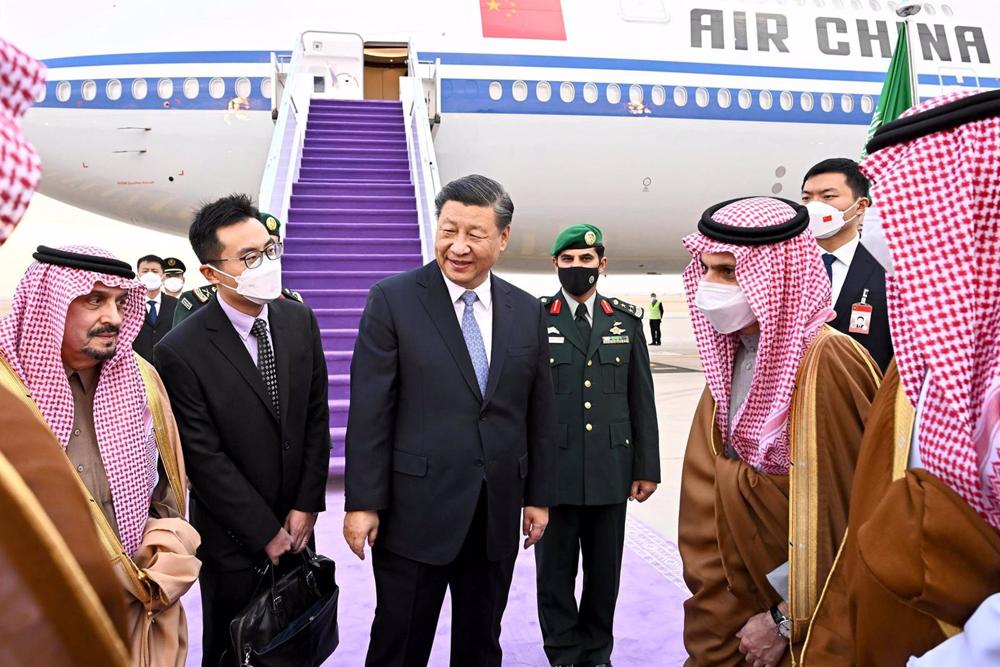 Xi lands in Riyadh to attend three summits and meet Saudi Arabia’s King Salman