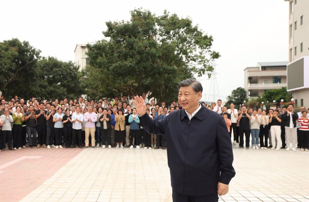 Xi